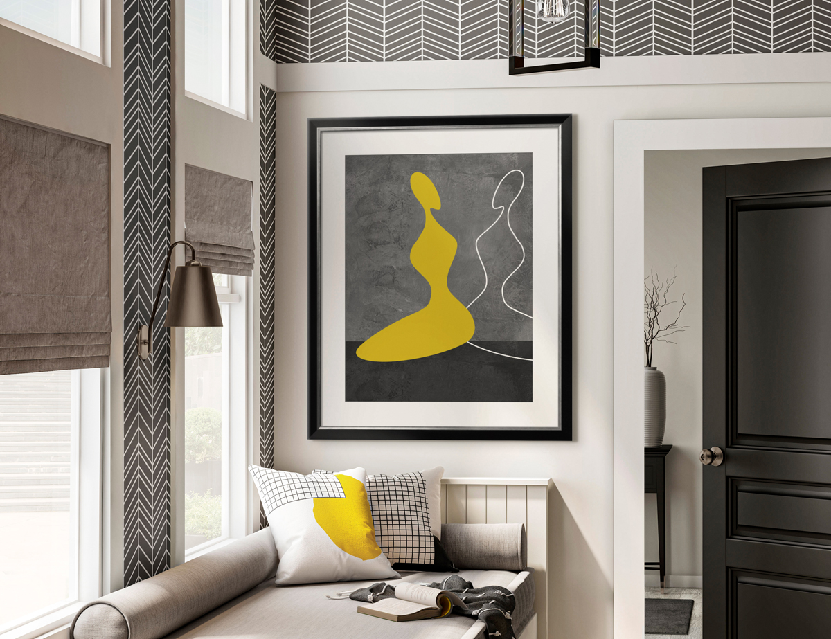 image of a reading nook with a large piece of art hung on the wall
