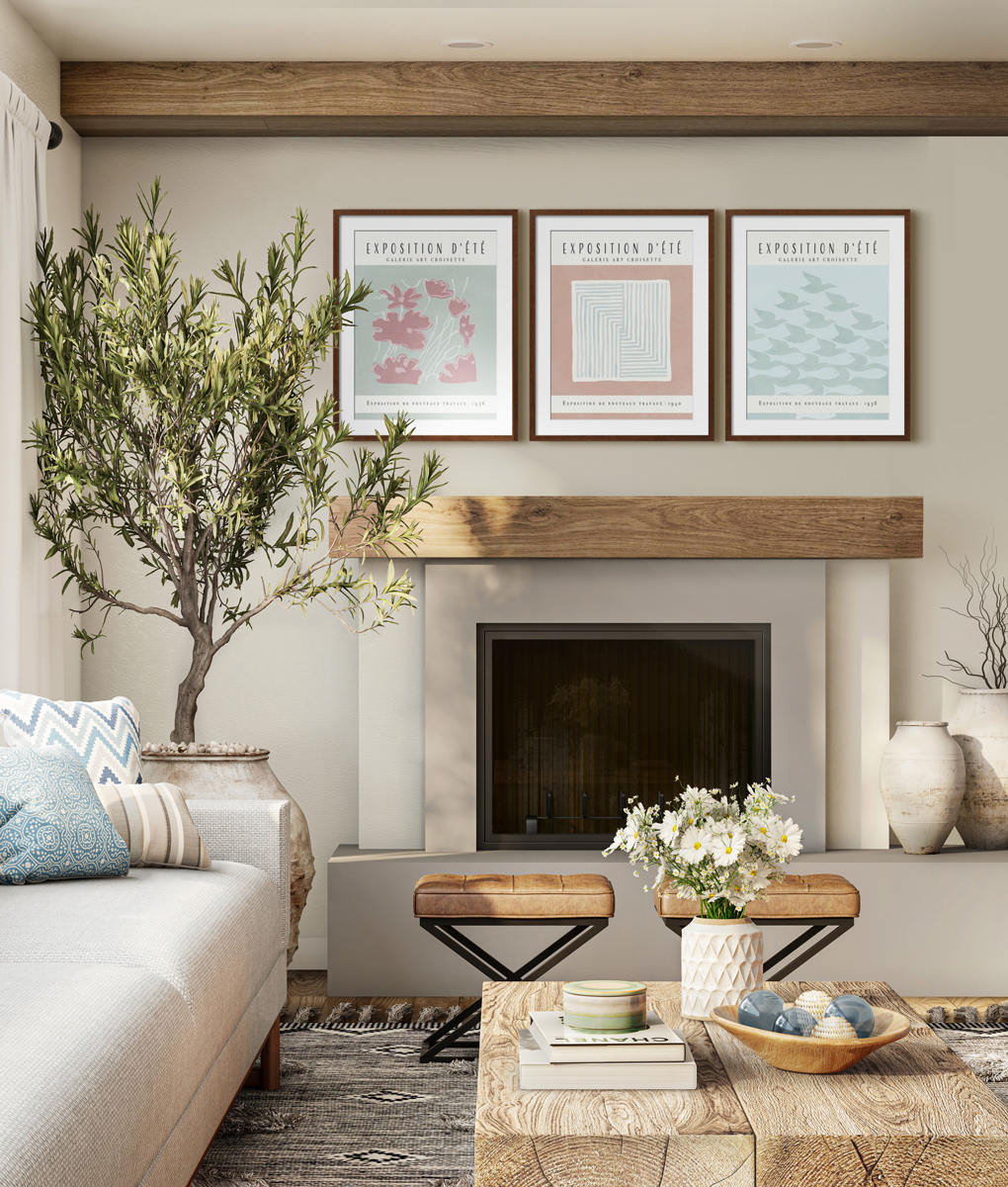 image of a living room with three posters hung over the fireplace mentel